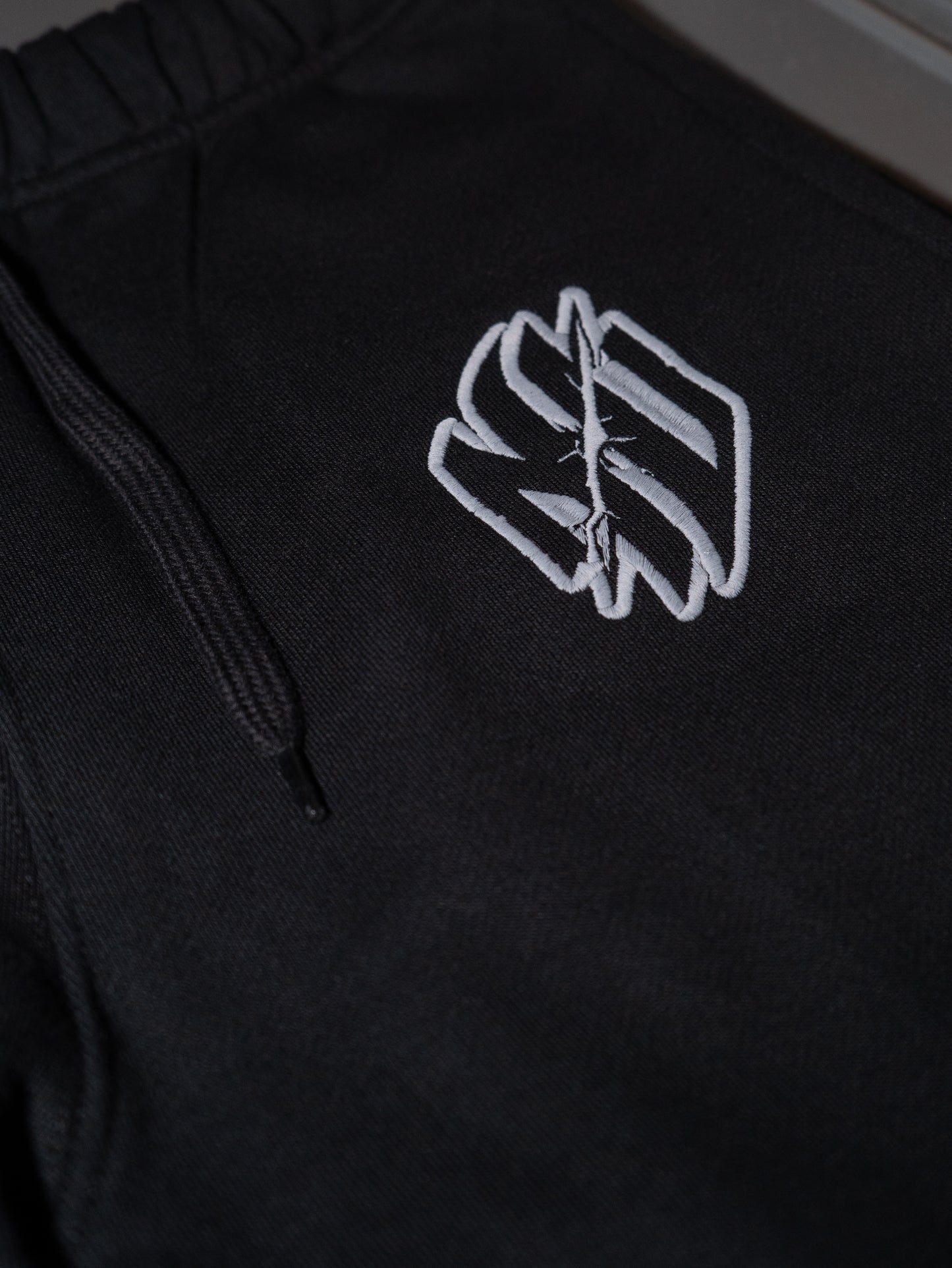 JOGGERS "STILLNESS" NEGROS